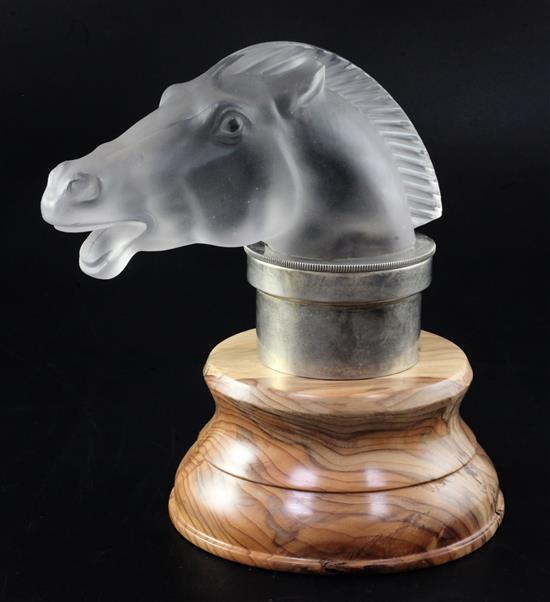 Epsom/Horse. A glass mascot by René Lalique, introduced on 5/6/1929, No.1153 Height with mount 13.5cm, overall 20.5cm.